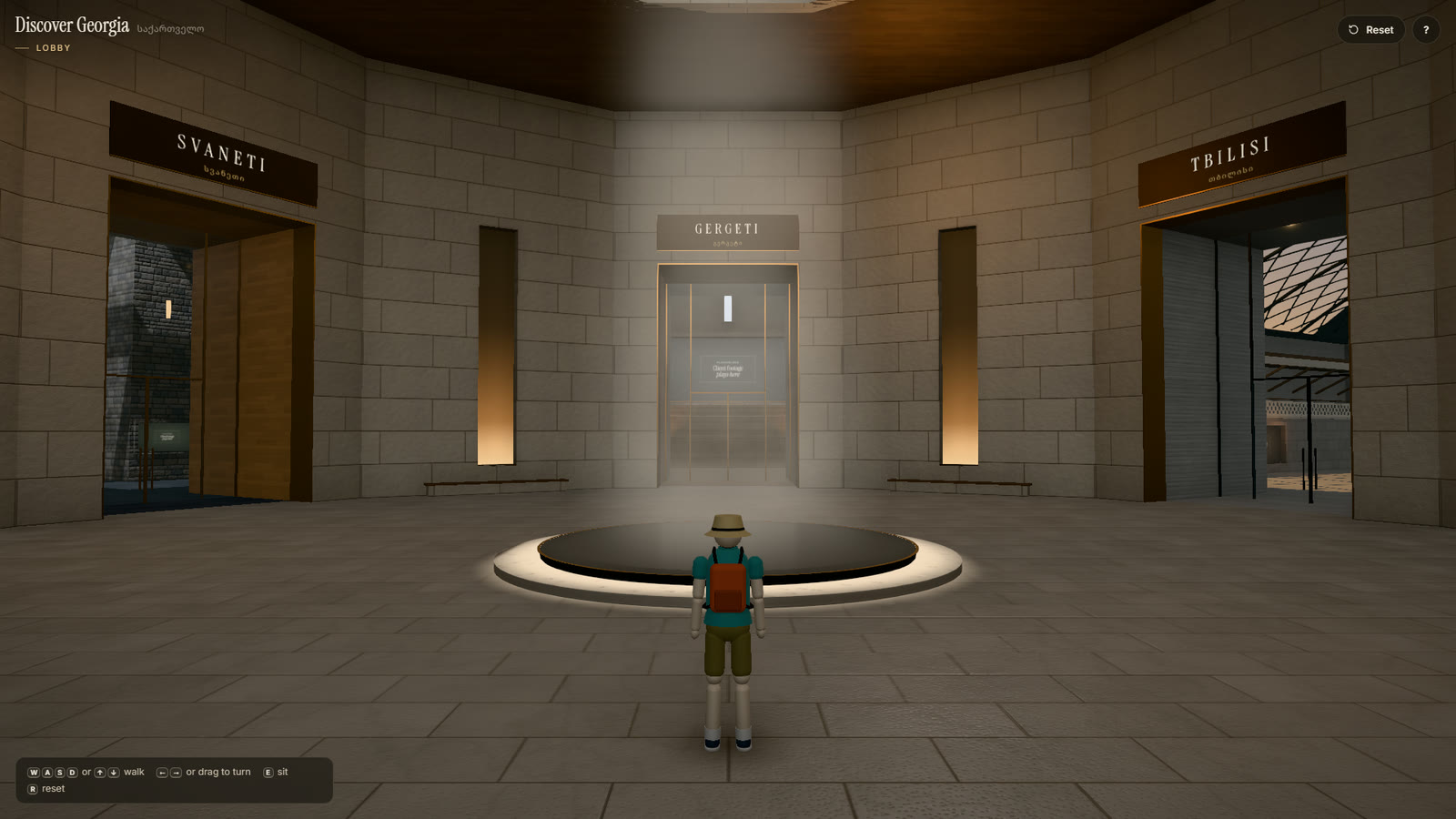 The prototype's lobby: a stone rotunda under a timber ceiling, with doors marked Svaneti, Gergeti and Tbilisi, and the visitor's avatar standing in the foreground.