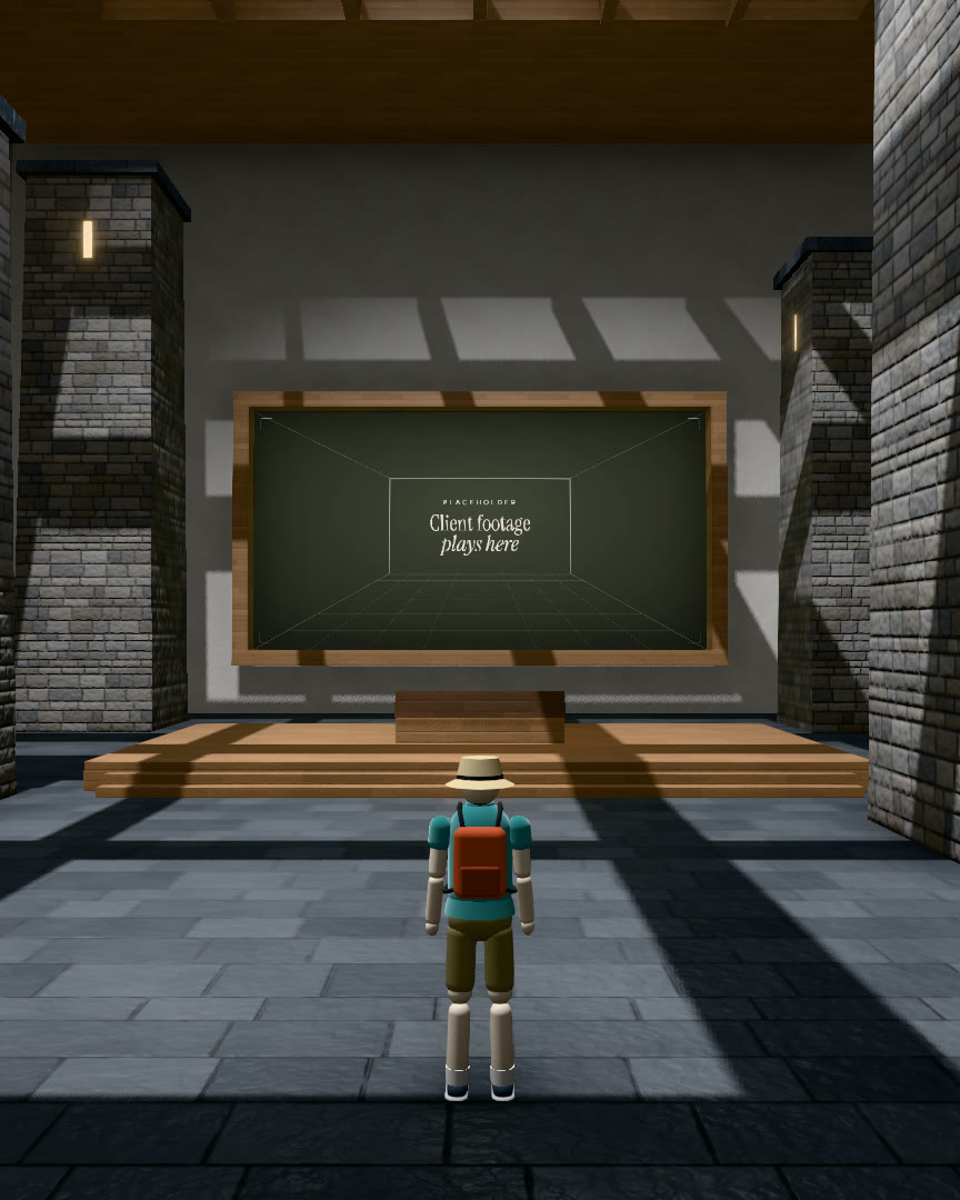 Svaneti room: tall stone towers on a slate floor in shafts of skylight, framing a screen that shows the placeholder.